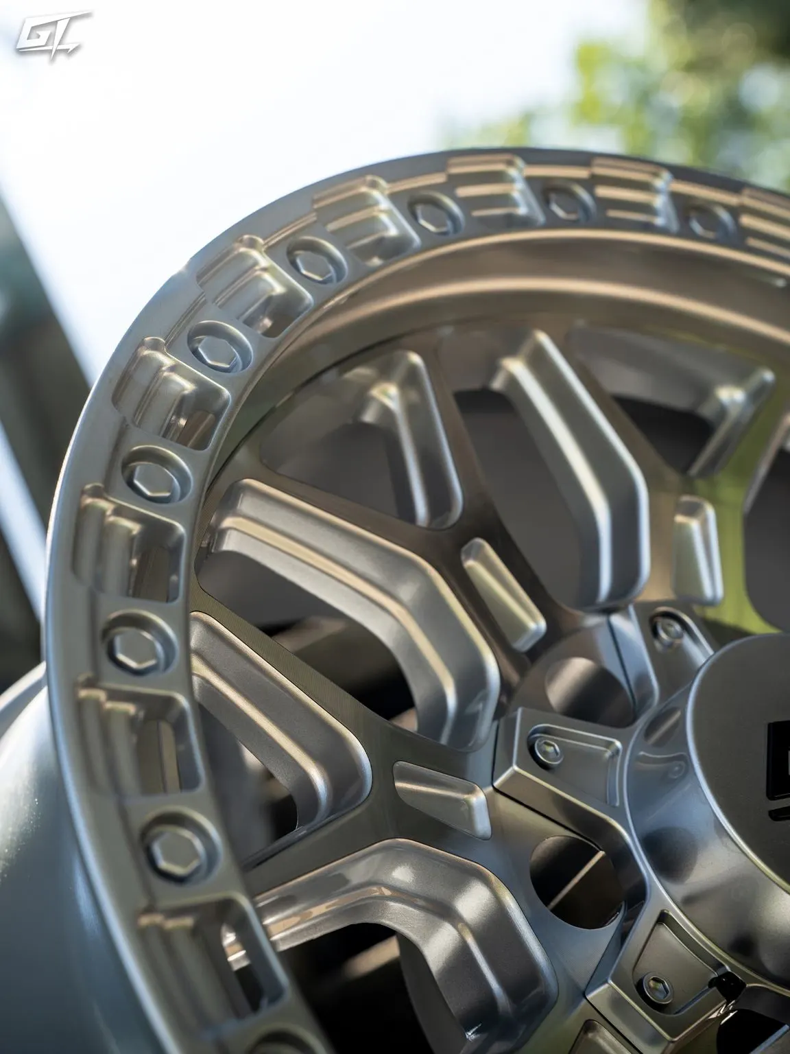 GT Off-Road Revolt in Silver Machined, close-up