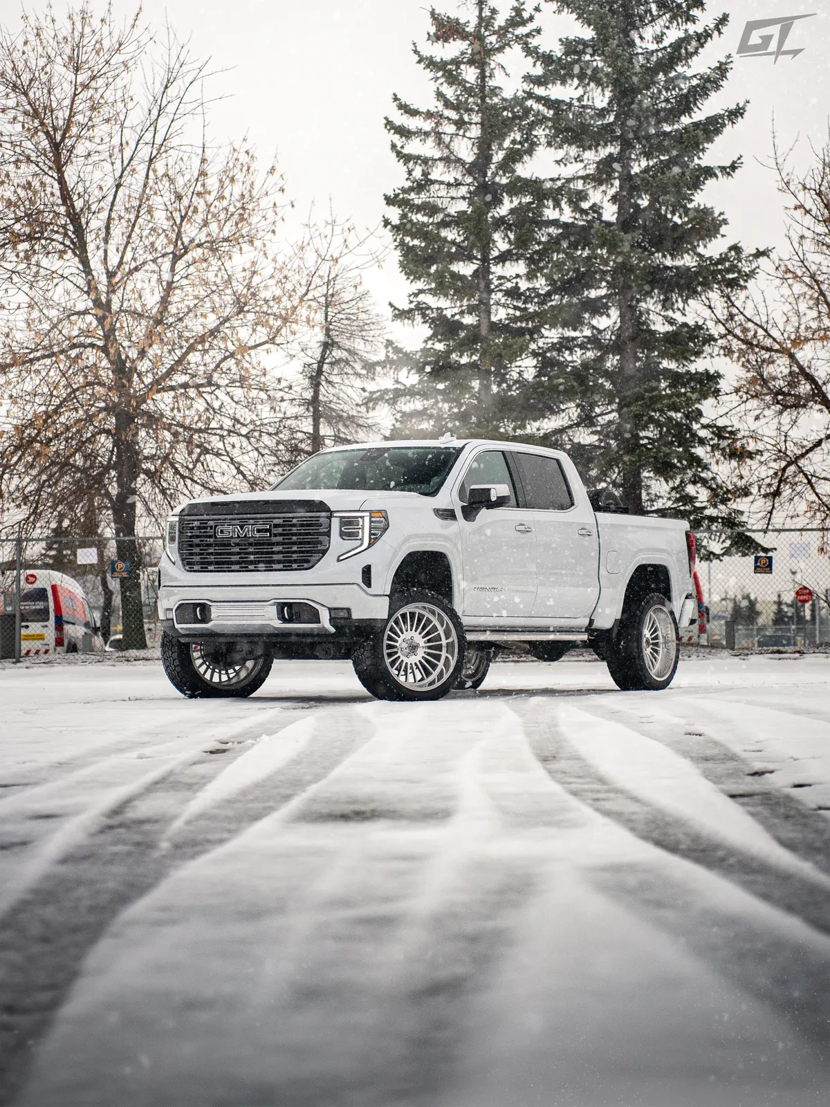 GMC Sierra on GT Off-Road Strike wheels in the snow